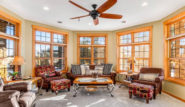 Lakefront, ground-floor condo with fireplace, patio, private grill & firepit in Three Lakes