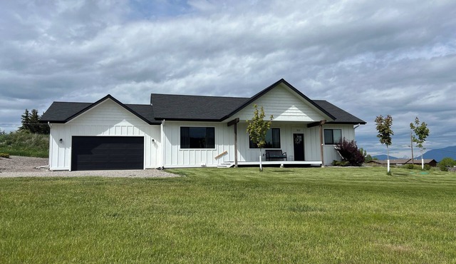 New house, with deck and amazing views on large country lot close to town. in Kalispell