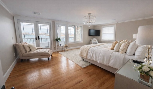 Stunning waterfront with sandy beach & dock walking distance to top restaurants! in Barnstable