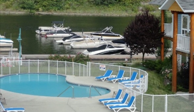 The Narrows 3rd Floor Condo. Lake Front, Pool and Hot Tub, Boat Slip Included. in Sicamous