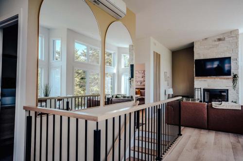 Huge Waterfront Modern Cottage on the Rouge River in Rivière-Rouge